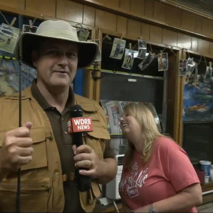 Keith Kaiser gets a lesson in fishing